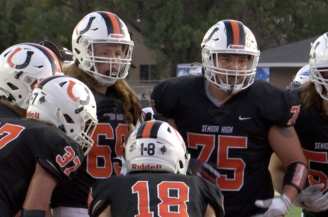 Senior FB Huddle 21.png