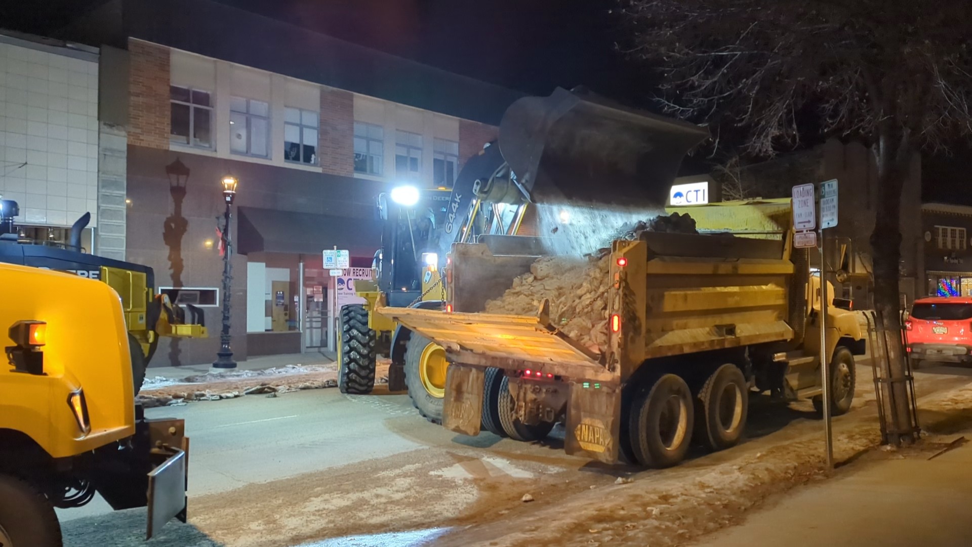 City of Helena crews work to remove snow buildup on Last Chance Gulch