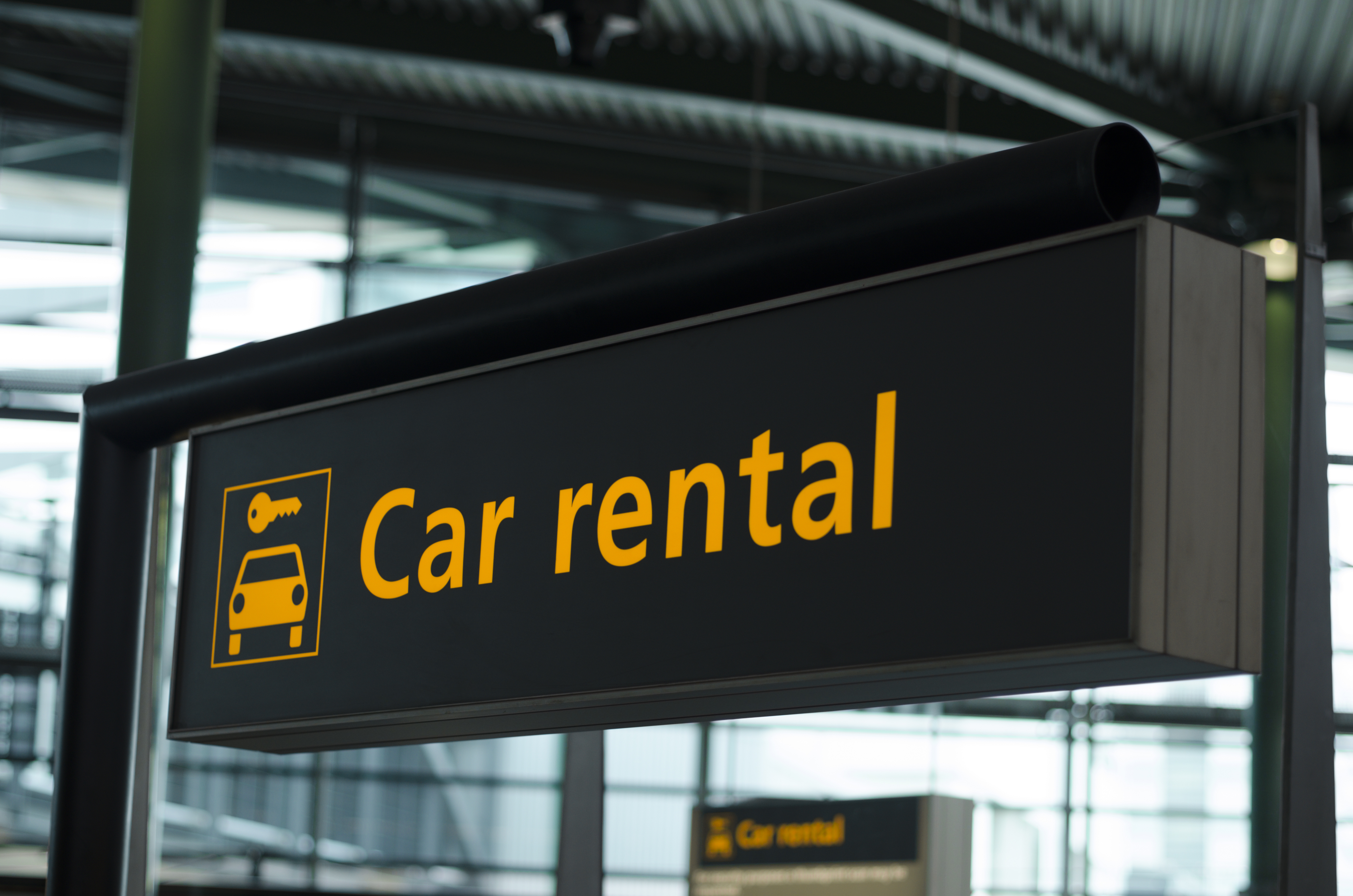 Sign,With,Direction,To,Car,Rental