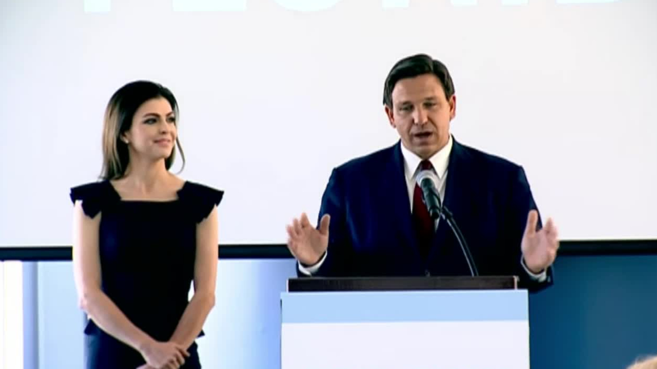 Florida Gov. Ron DeSantis and First Lady Casey DeSantis hold a news conference in Orlando on Feb. 26, 2021.jpg