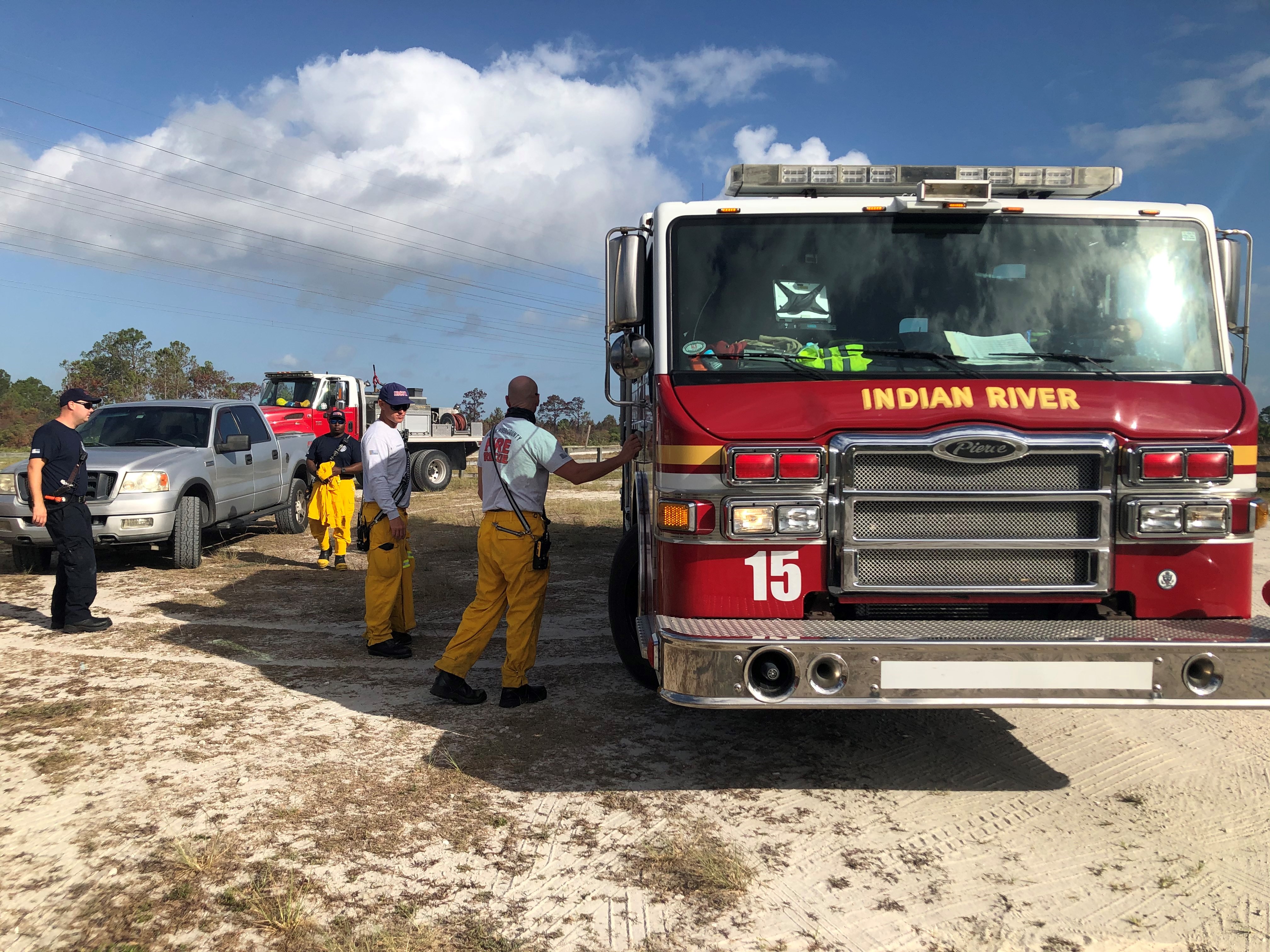 The Florida Fire Service says a preliminary investigation has determined Friday’s 1,600-acre wildfire was caused by an unattended campfire left in the park by someone on Thursday evening.