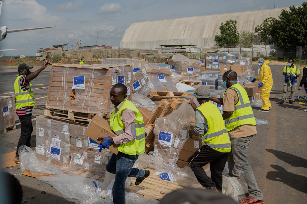 Workers offload medical and emergency supplies donated by European Union to support frontline workers in fighting Ebola upon arrival at the national airport in Bunia, Congo. Thursday, May 28, 2026. 