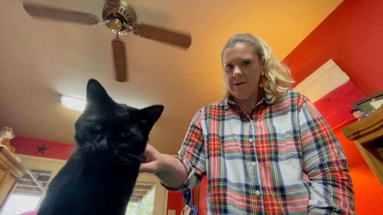 CAT REUNITES WITH FAMILY OF KILLED MOTORCYCLIST pic.jpg