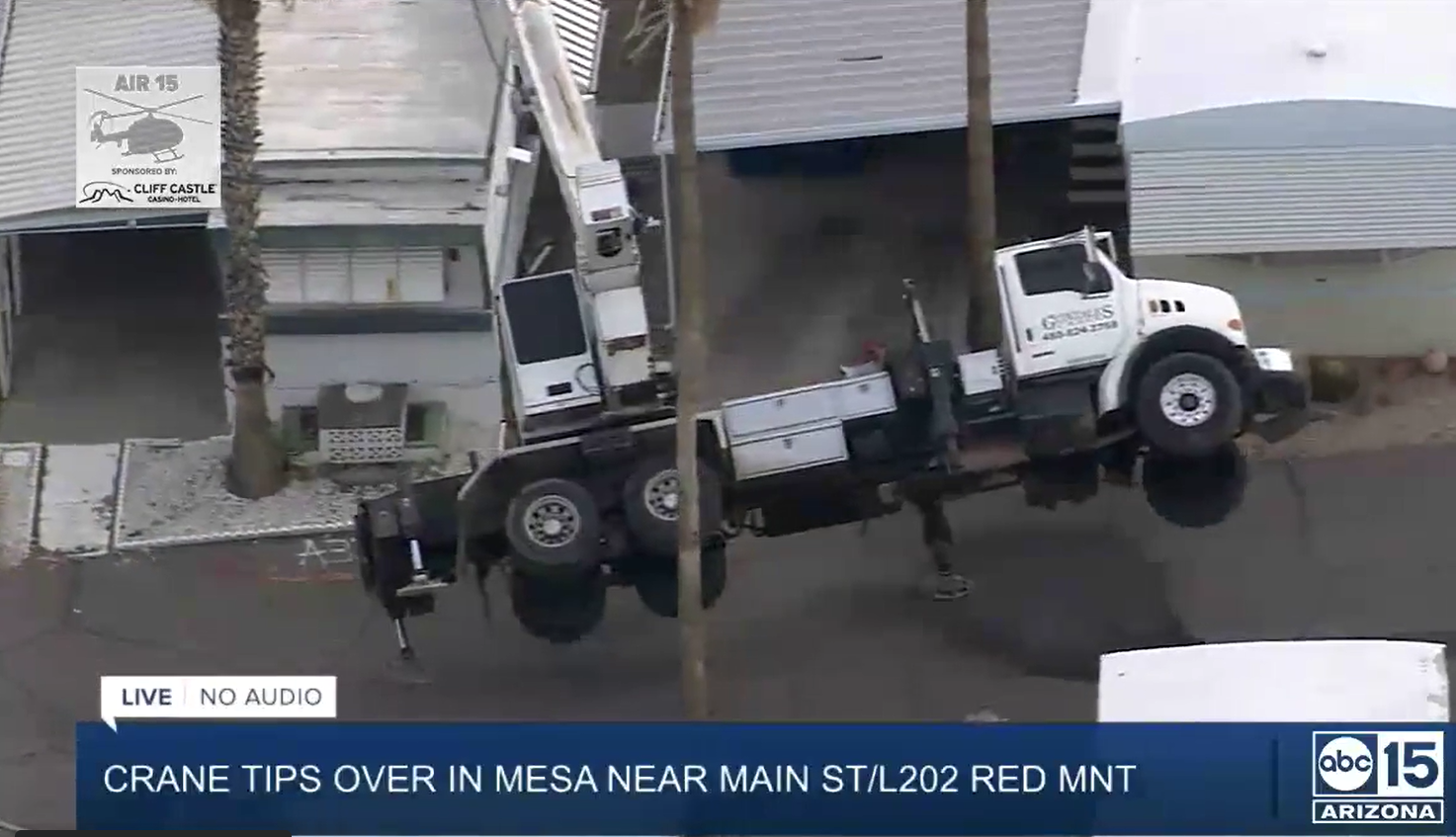 crane tips over mobile home in mesa.PNG