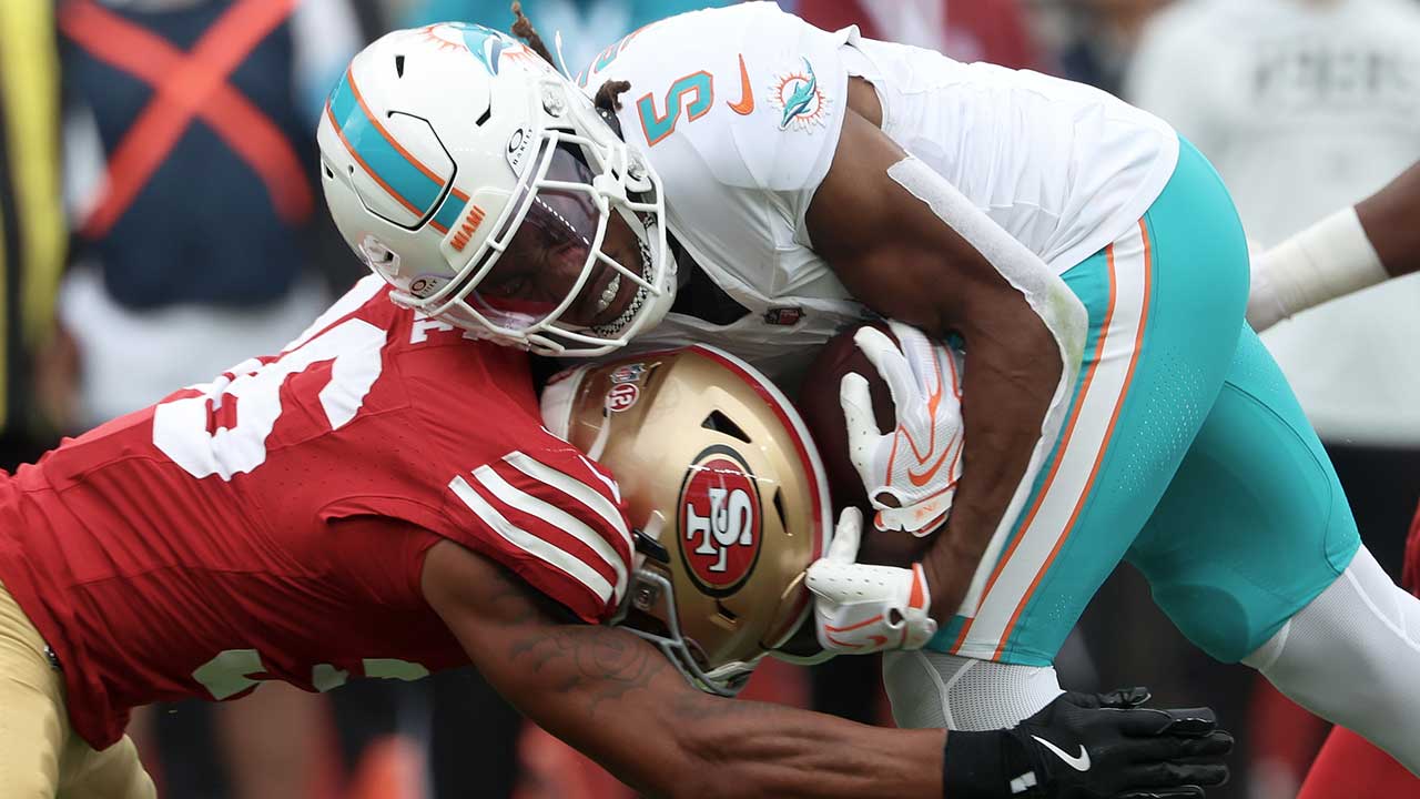 Miami Dolphins running back Jaylen Wright (5) is hit by San Francisco 49ers safety Marques Sigle during the first half of an NFL football game in Santa Clara, Calif., Sunday, Sept. 20, 2026. (AP Photo/Jed Jacobsohn)