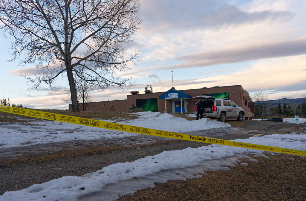 Police began putting tape out near the Tumbler Ridge Secondary School and surrounding buildings in Tumbler Ridge, B.C. on Wednesday, Feb. 11, 2026.