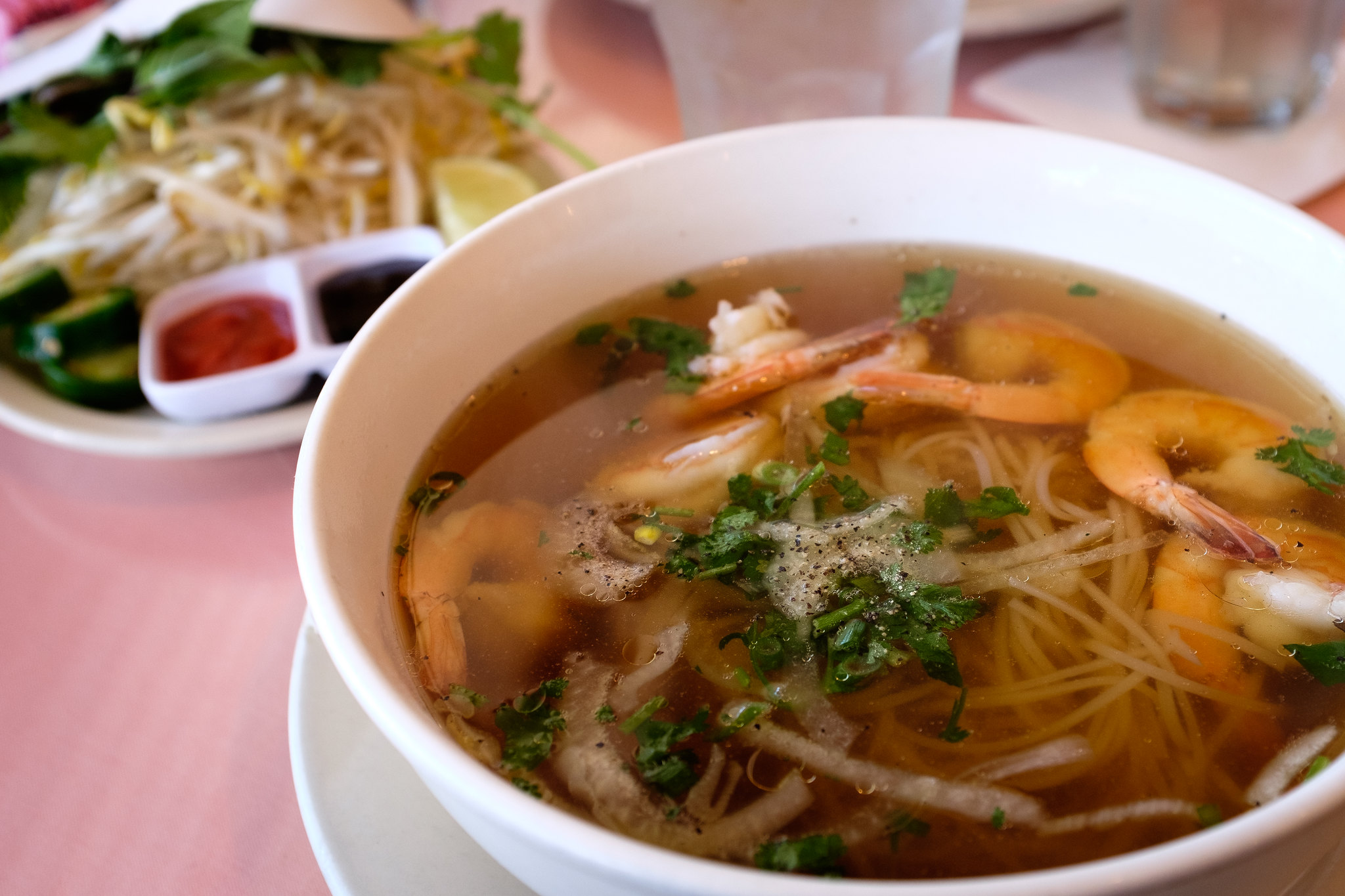 A bowl of shrimp pho.