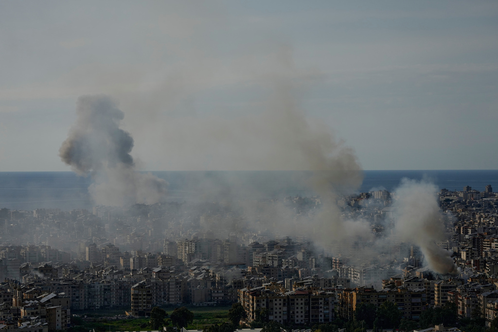 Smoke rise following Israeli airstrikes in Dahiyeh, Beirut's southern suburbs, Lebanon, Friday, March 6, 2026. 
