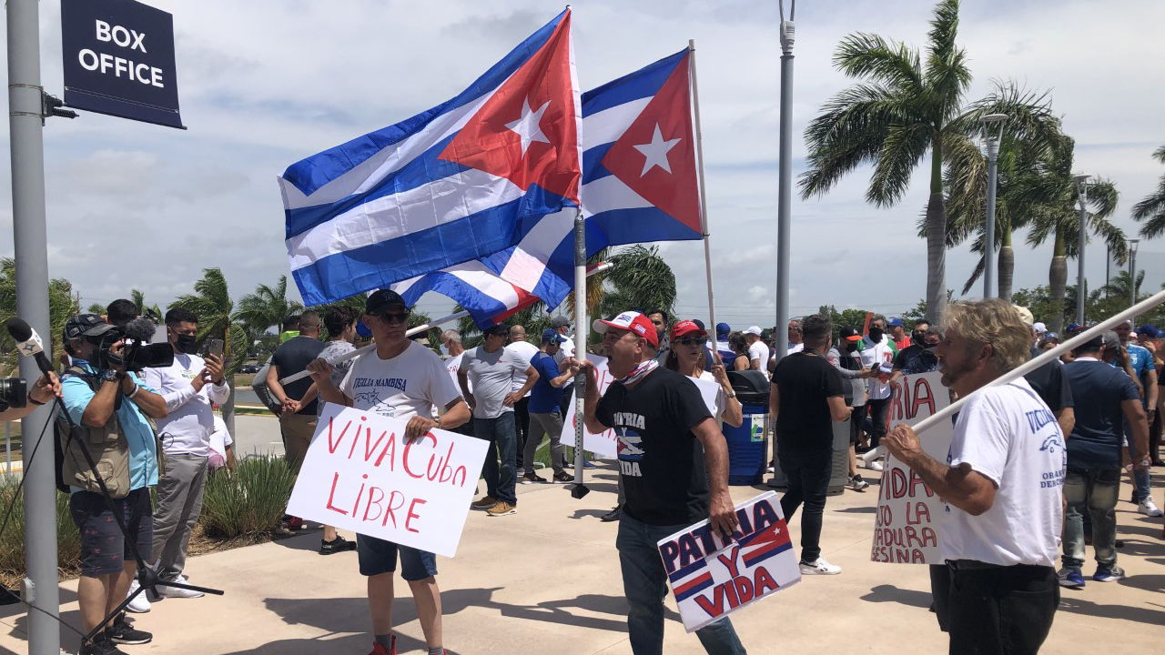Baseball fans cheer outside the Ballpark of the Palm Beaches in West Palm Beach on May 31, 2021.jpg