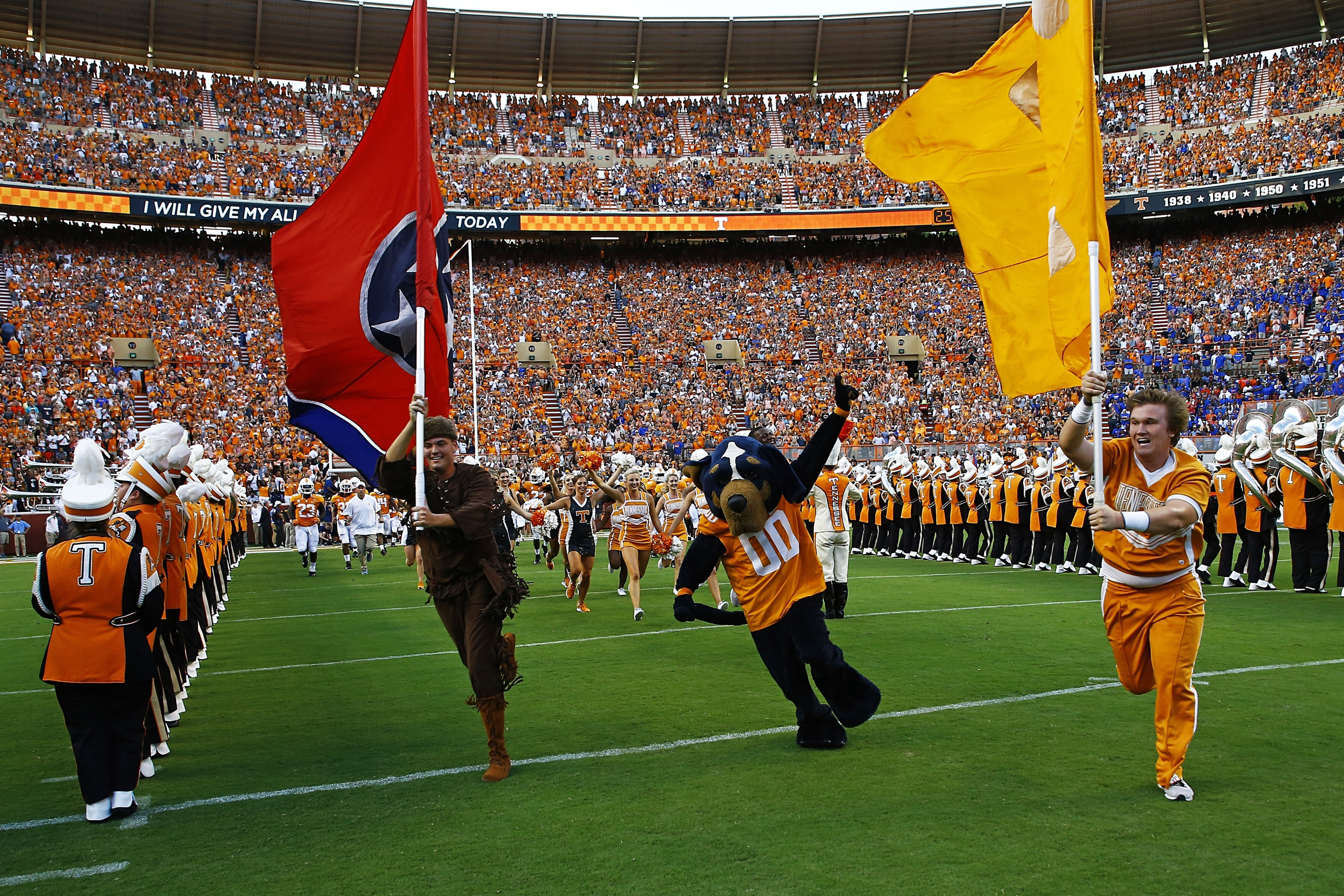 Virus Outbreak Tennessee Budget Cuts Football