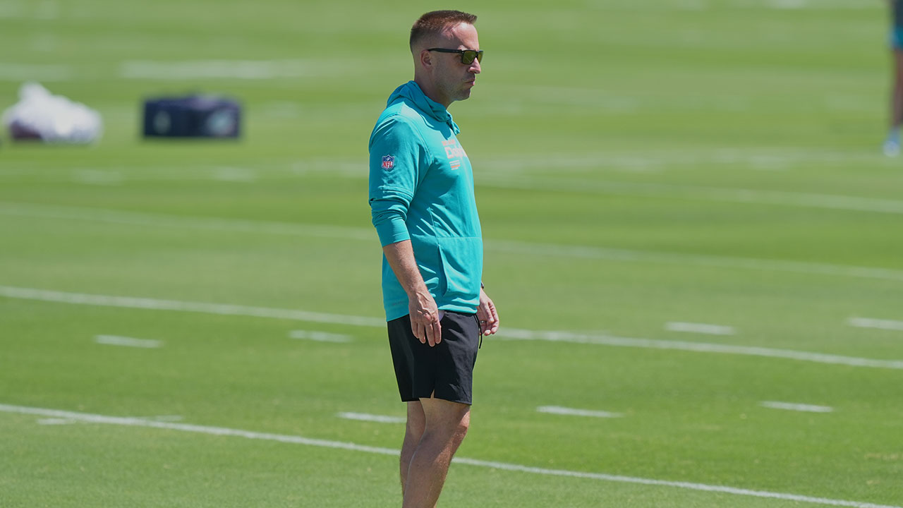 Miami Dolphins head coach Jeff Hafley stands on the practice field during the NFL football team's rookie minicamp Friday, May 8, 2026, in Miami Gardens, Fla. (AP Photo/Marta Lavandier)