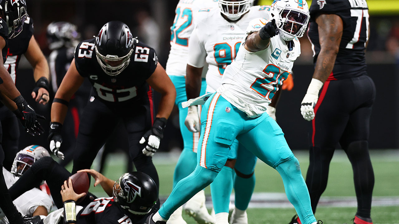 Miami Dolphins linebacker Jordyn Brooks (20) reacts after sacking Atlanta Falcons quarterback Kirk Cousins (18) during the first half of an NFL football game, Sunday, Oct. 26, 2025, in Atlanta. 