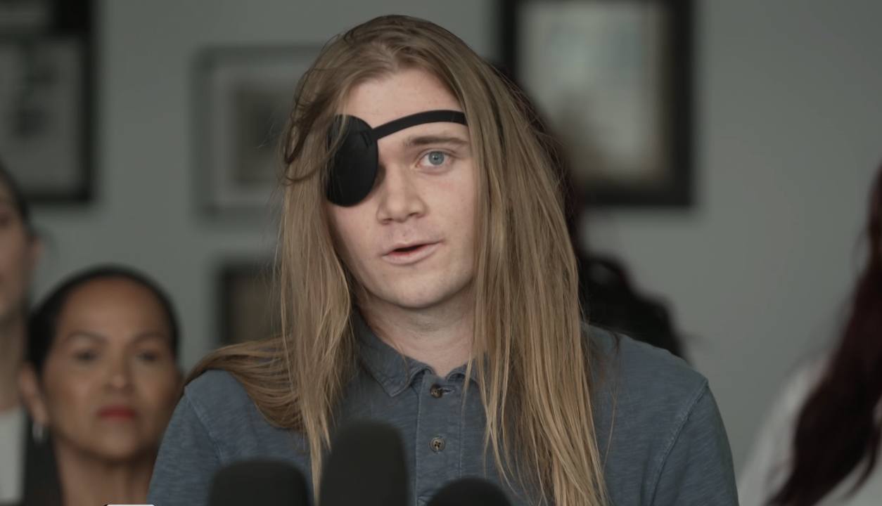 Tucker Collins speaks with the media in Los Angeles. 