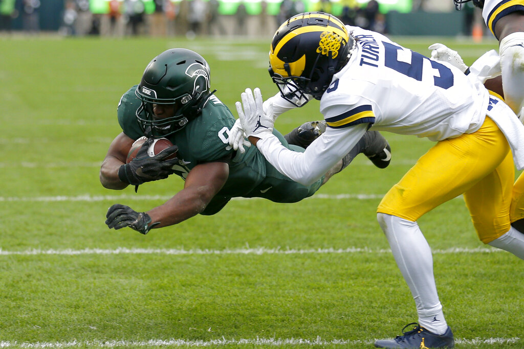 Kenneth Walker III, DJ Turner Michigan Michigan State Football