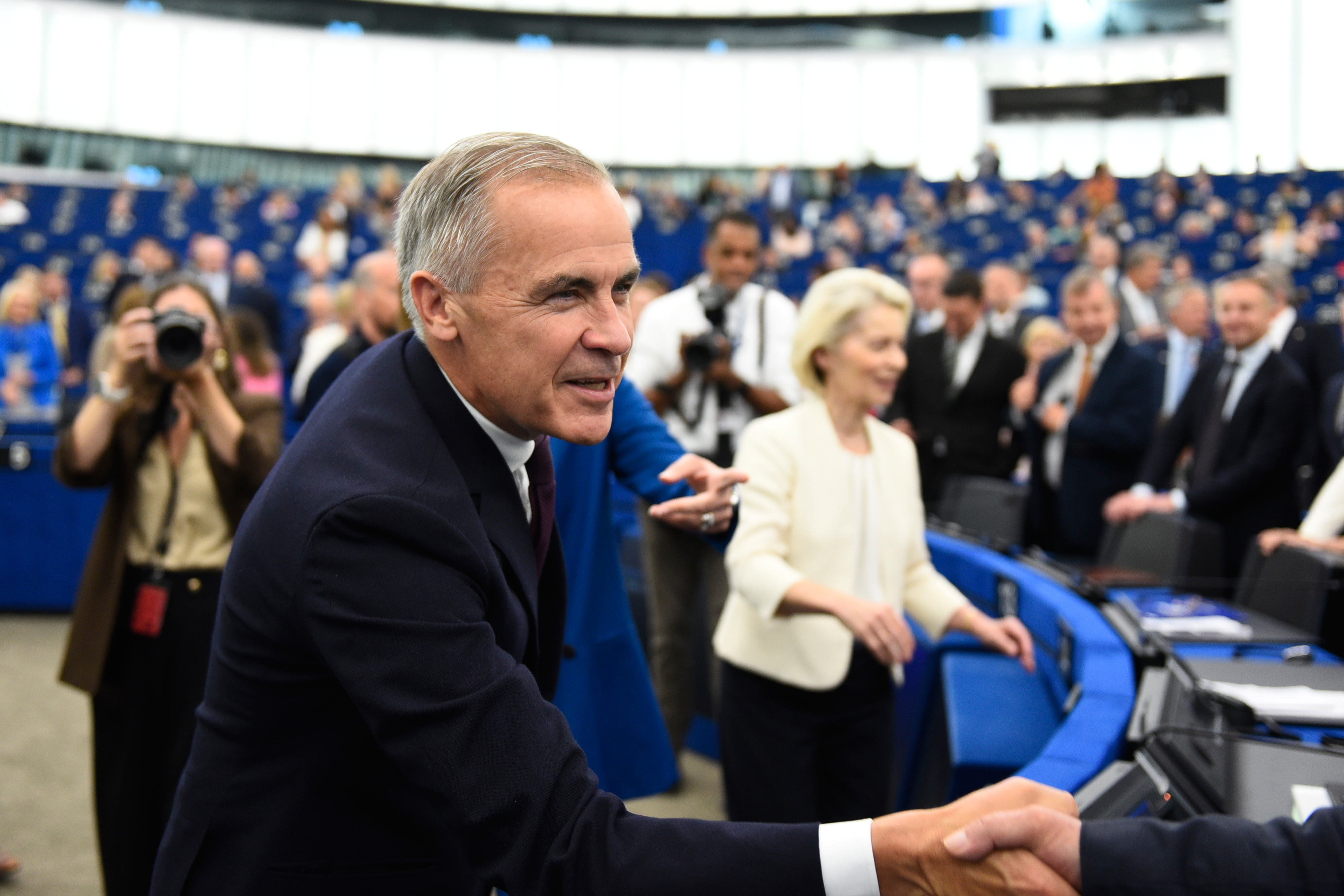 Canada's Prime Minister Mark Carney, left, and European Commission President Ursula von der Leyen arrive for the annual State of the European Union at the European Parliament in Strasbourg, eastern France, Wednesday, Sept 16, 2026.