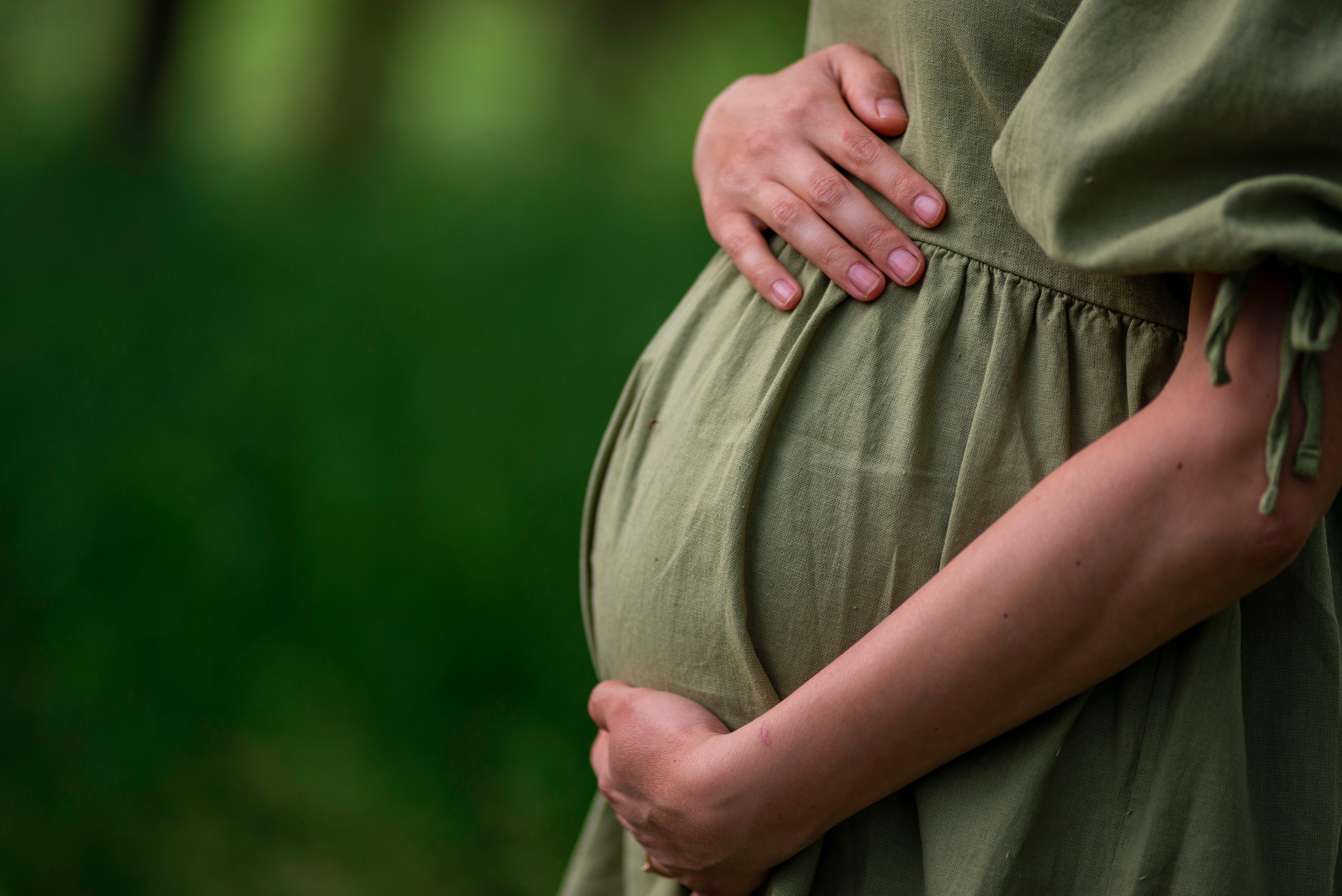 A pregnant woman.