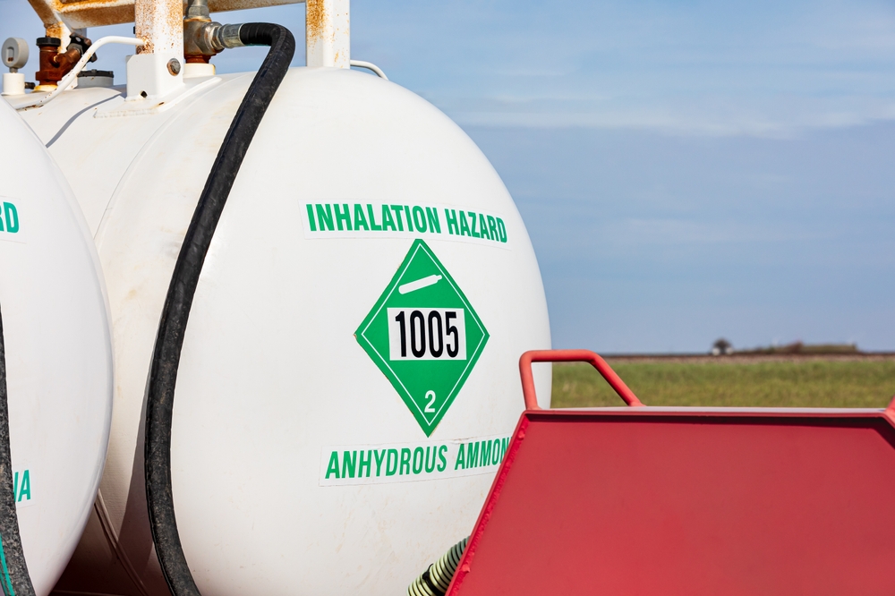 Anhydrous ammonia tank in farm field. 