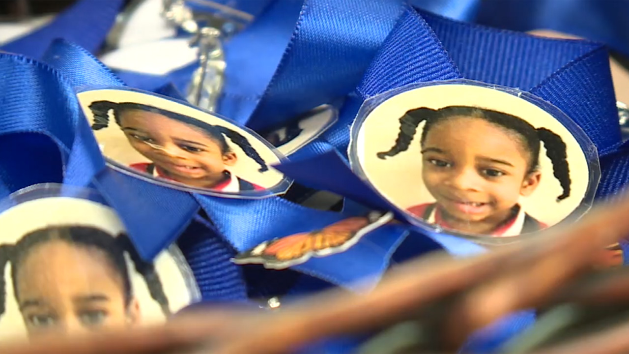 Dahud Jolicoeur photos on lanyards