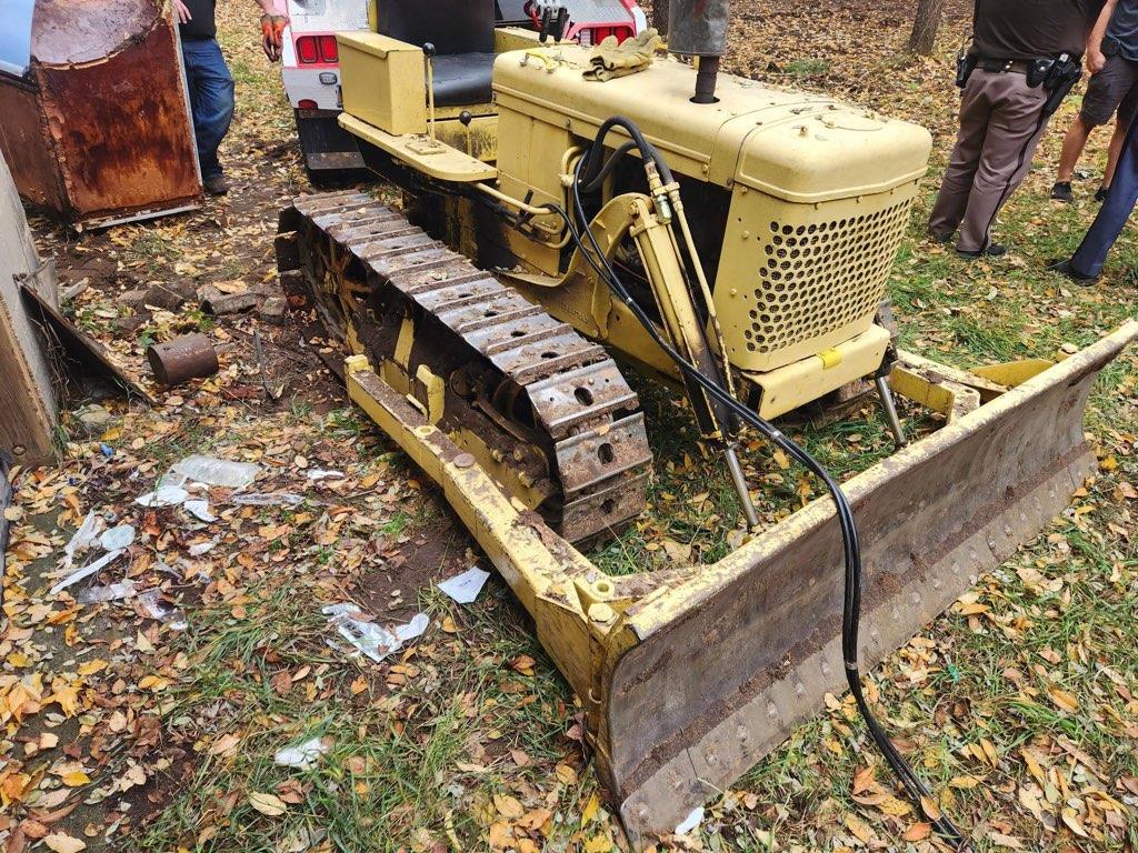 Man Trapped Under Bulldozer