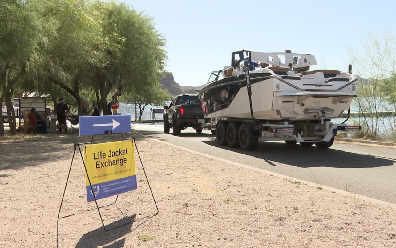 Saguaro Lake life jacket exchange boat