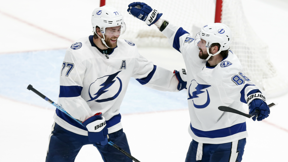 Nikita Kucherov celebrates with Victor Hedman