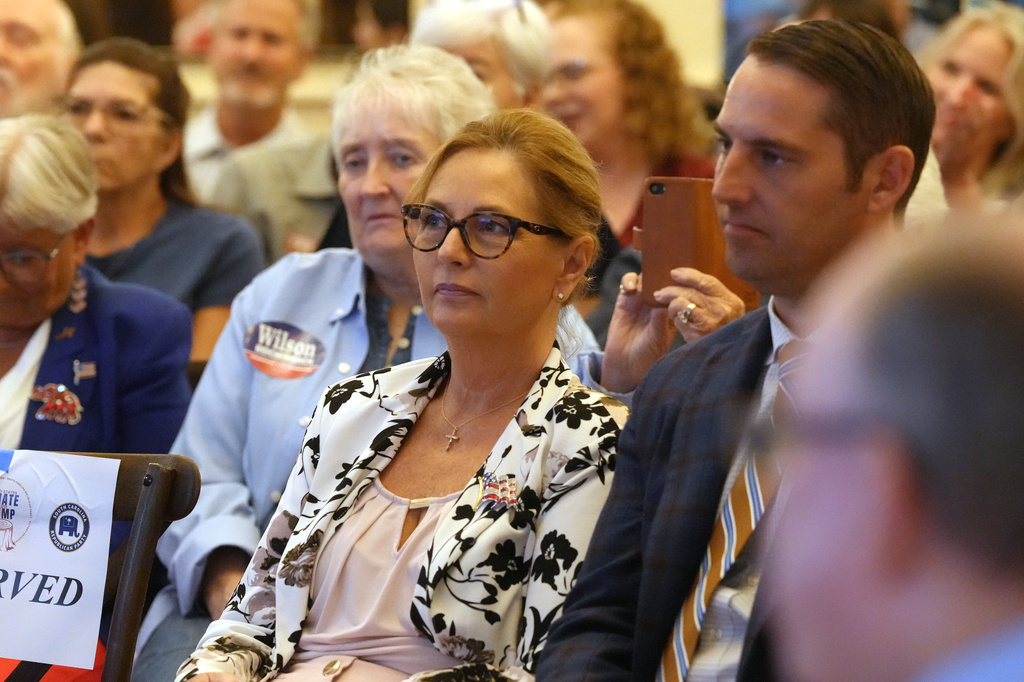 Sen. Darline Graham, R-S.C., center, waits for her turn to speak at a candidate event for hopefuls vying in a special Republican primary to replace her late brother Sen. Lindsey Graham, R-S.C., on November ballots, Saturday, Aug. 8, 2026, in Florence, S.C. 