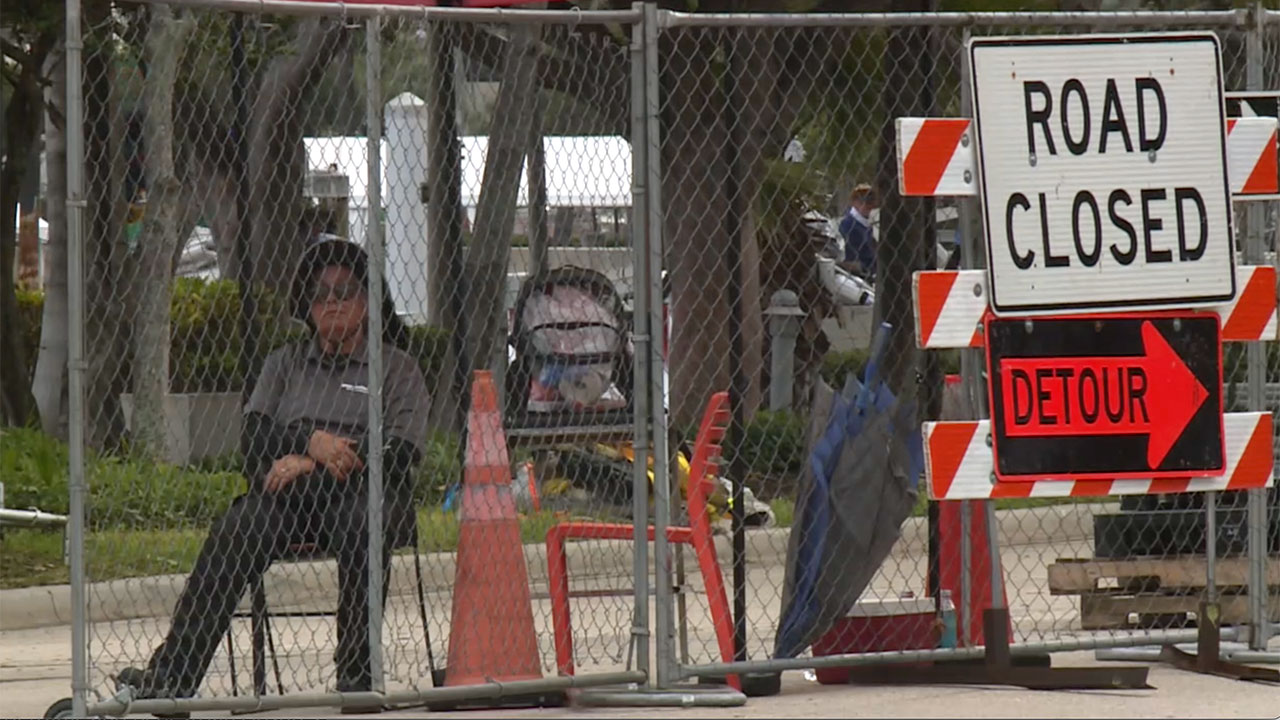 A road closed and detour sign in downtown West Palm Beach due to the boat show.