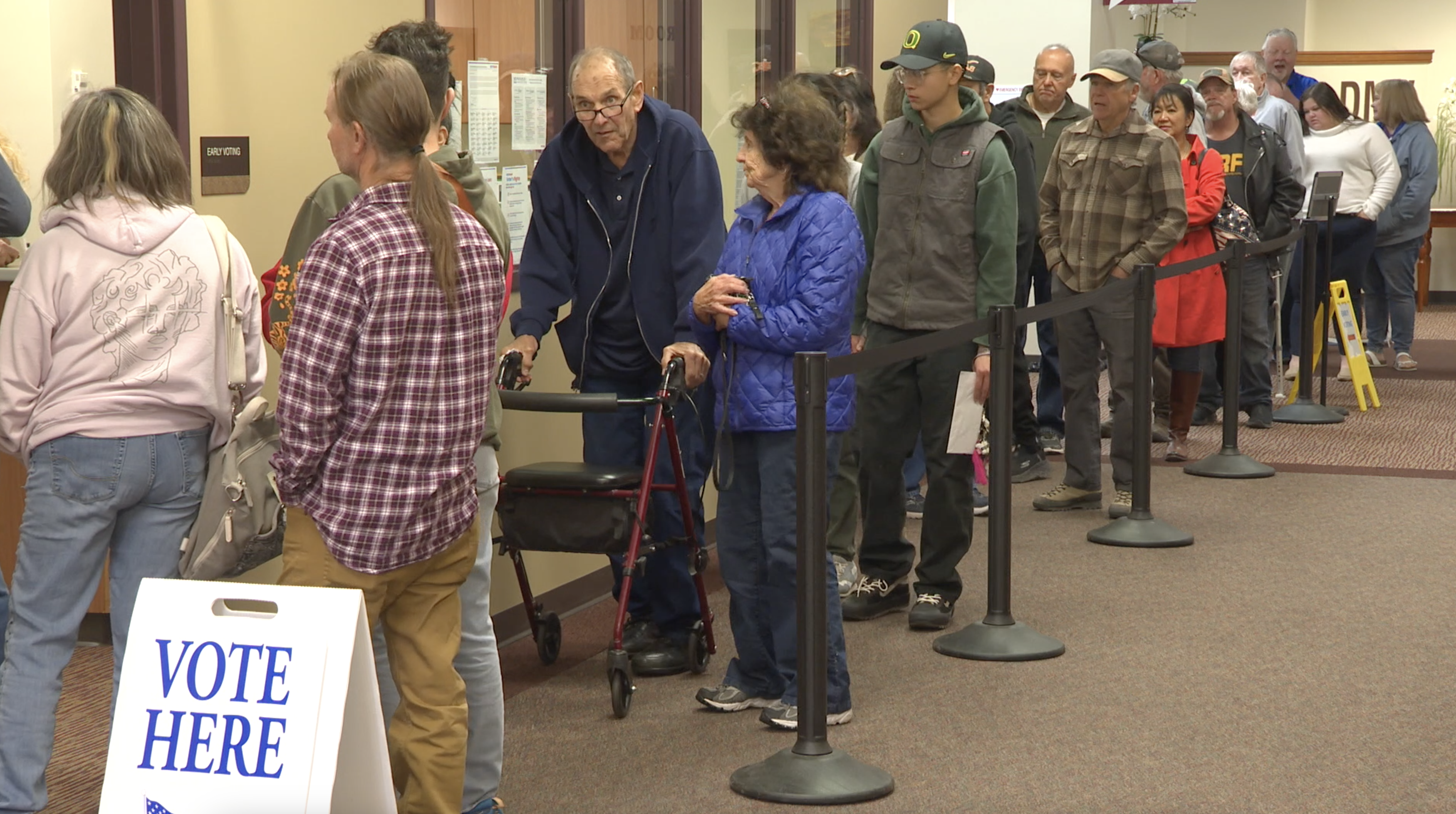 A line of people wait outside the polling location at Twin Falls County West building on Monday, Oct 28, 2024
