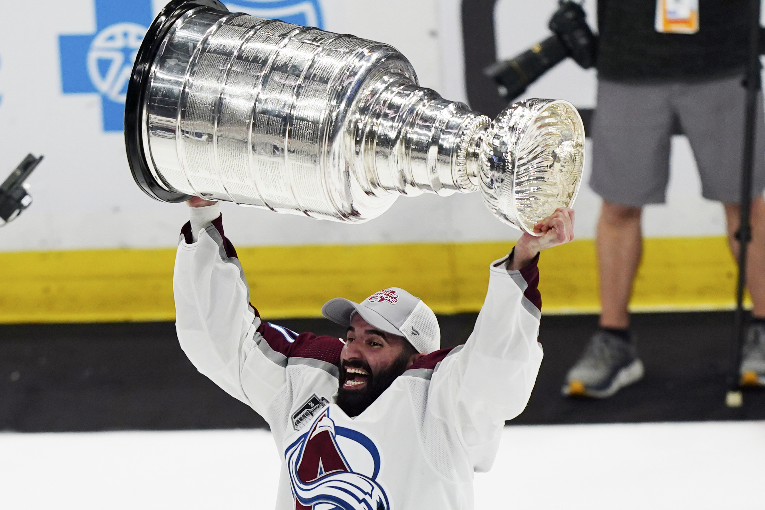 After parade, work begins for Avs in bid to repeat as champs