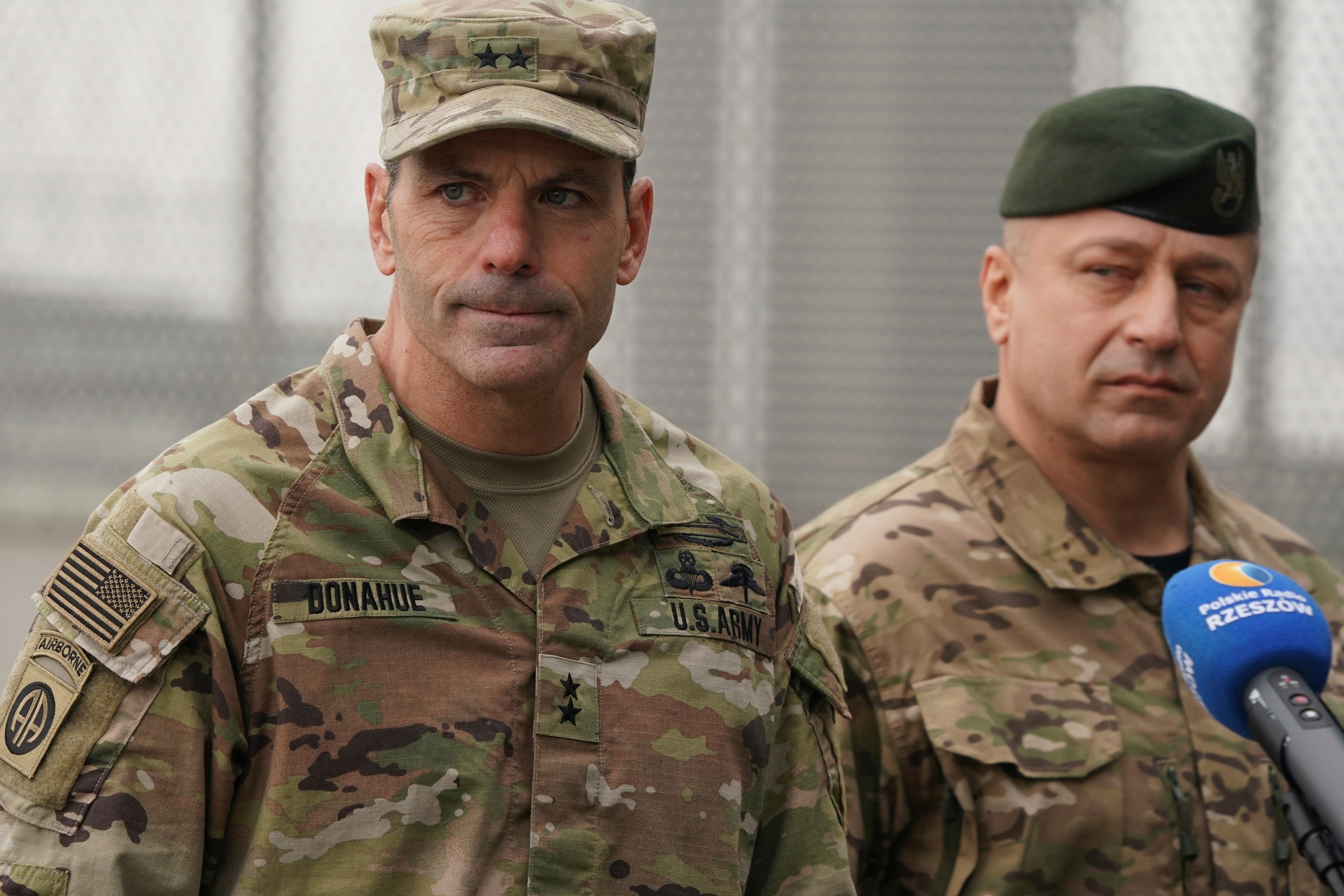 FILE - U.S. Army General Christopher Donahue, left, commanding general of the 82nd Airborne Division.