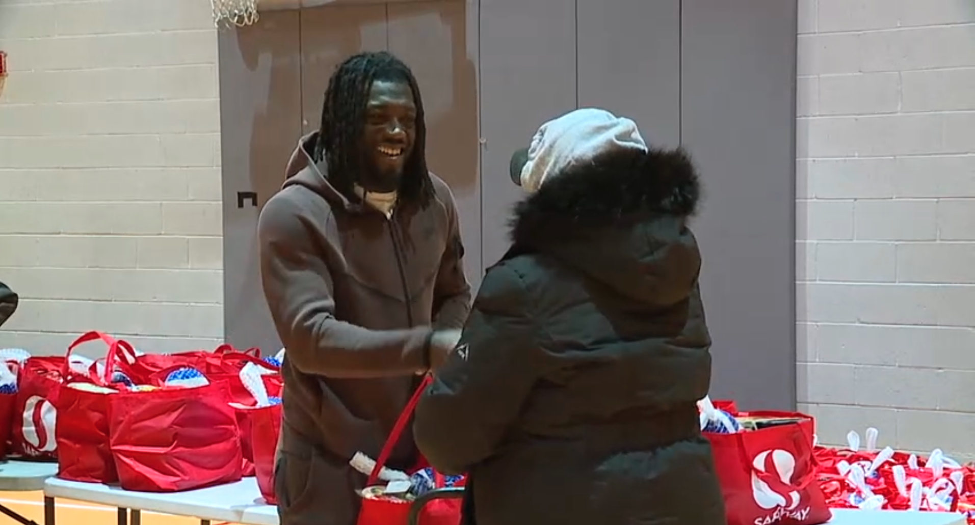 Ravens players fund Thanksgiving turkey giveaway in Baltimore