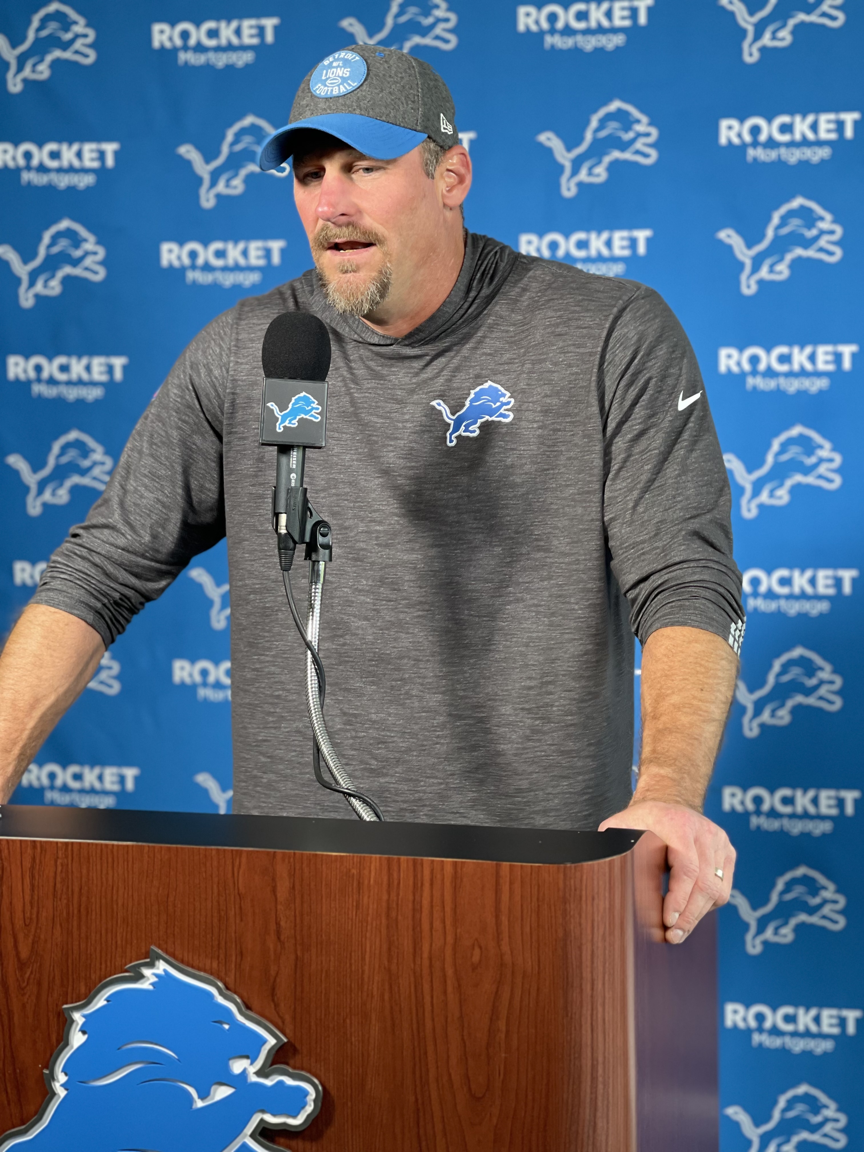 Dan Campbell at podium