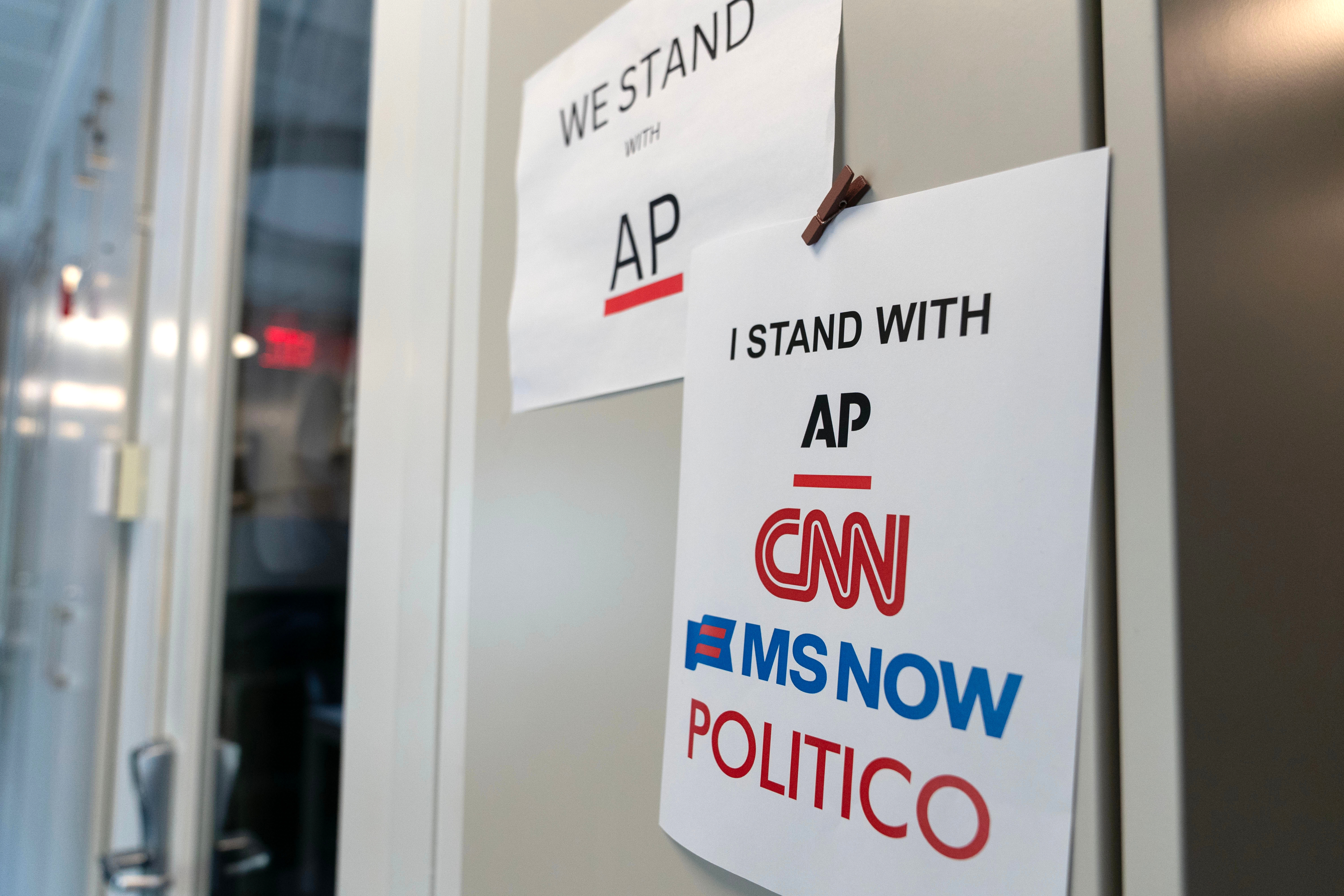 A sign in support of news outlets is seen at the White House press room, Sept. 19, 2026, in Washington.