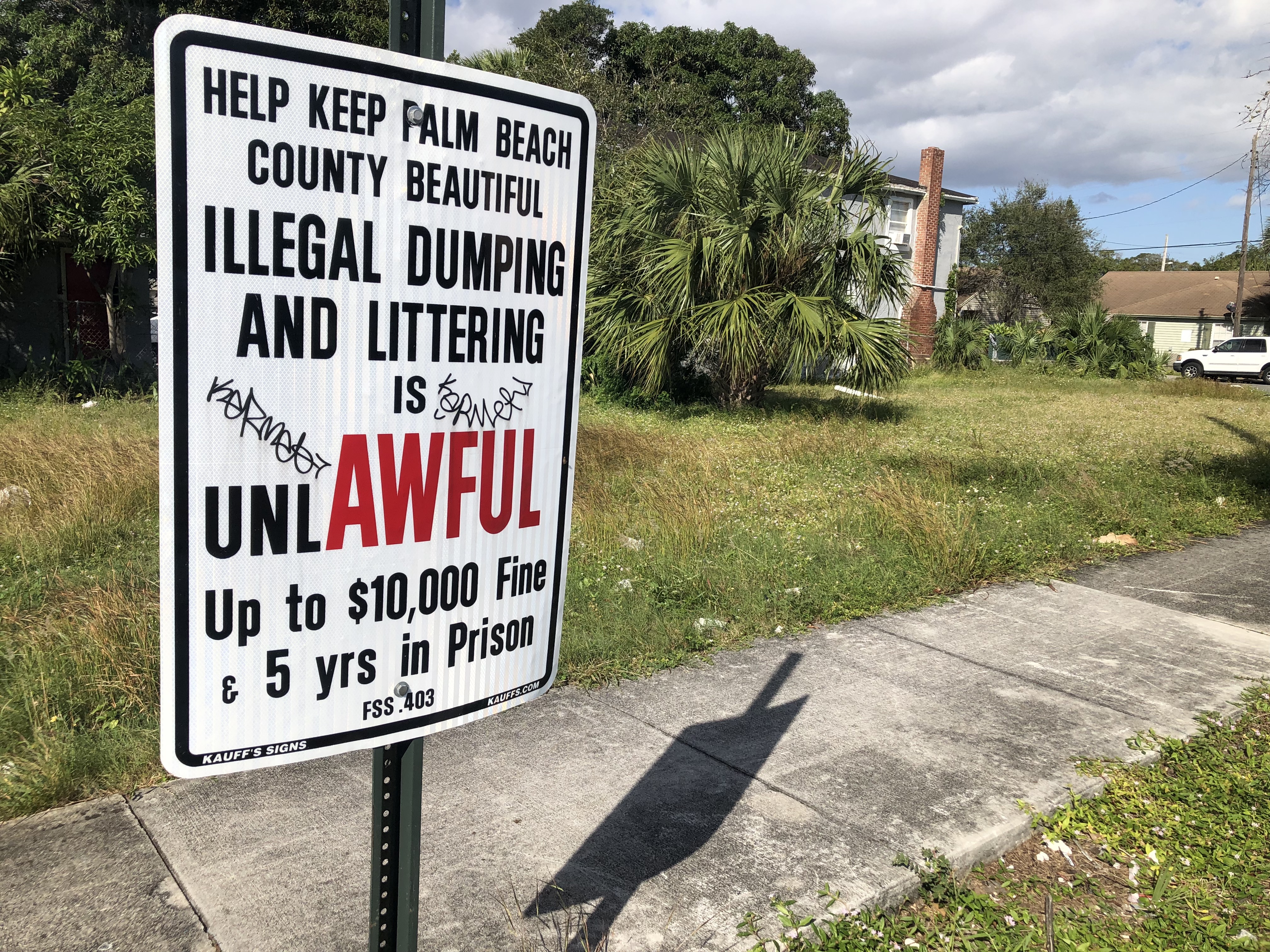 Palm Beach County illegal dumping sign