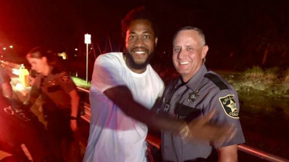 Collier County Deputy Robert Pounds helps deliver baby