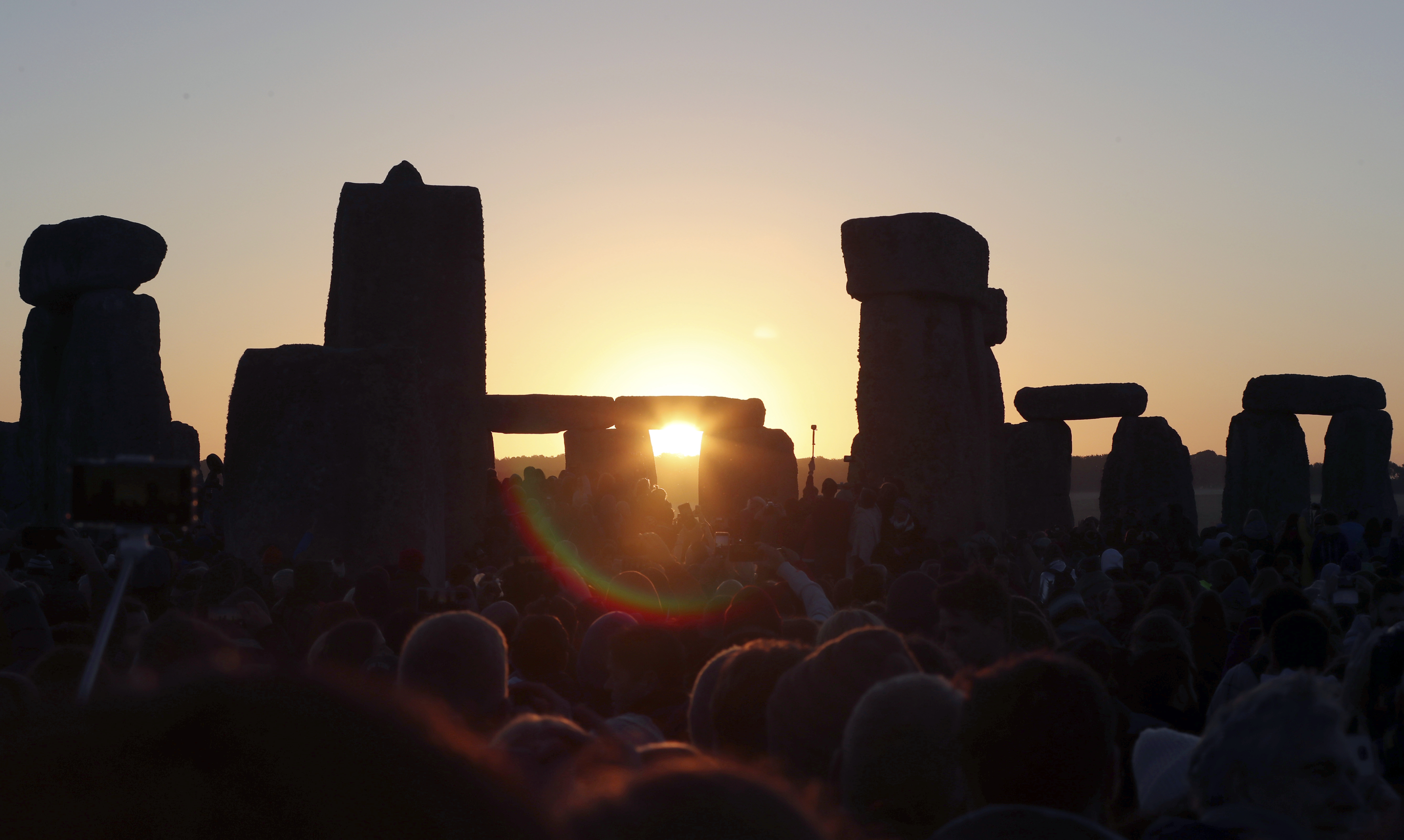 Scientists find huge ring of ancient shafts near Stonehenge