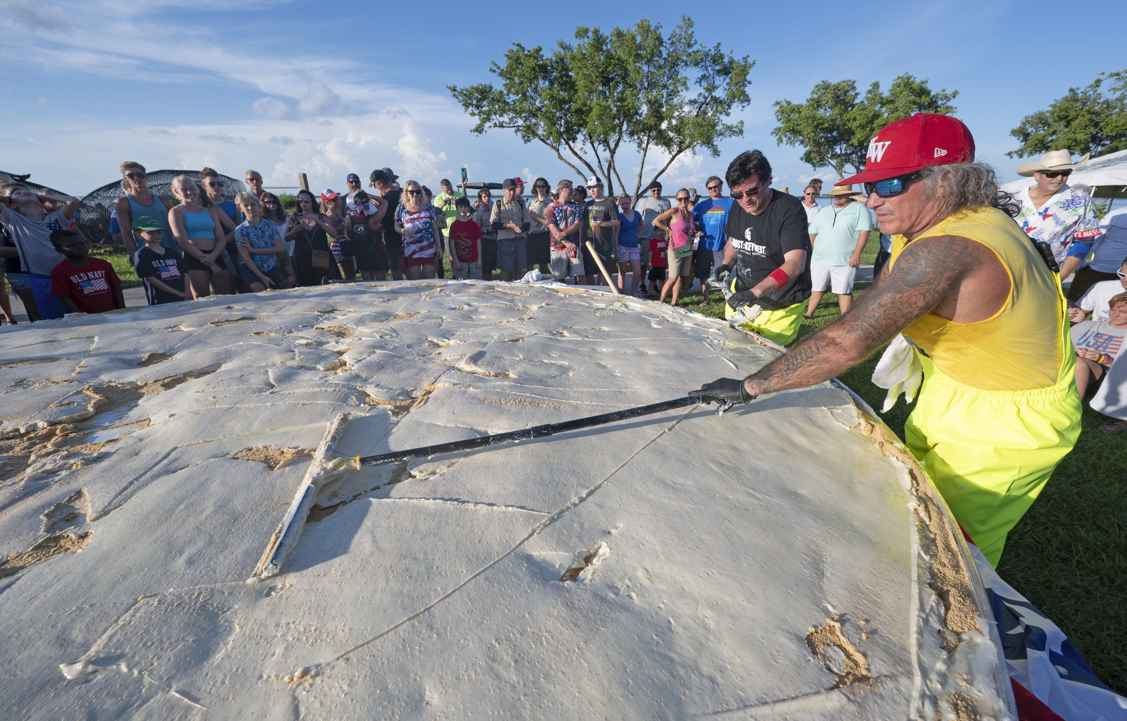 Chefs Paul Menta and David Sloan put finishing touches on giant Key lime pie, July 3, 2023