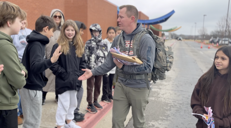 Micheal Goodin receiving letters from Highland Park Elementary