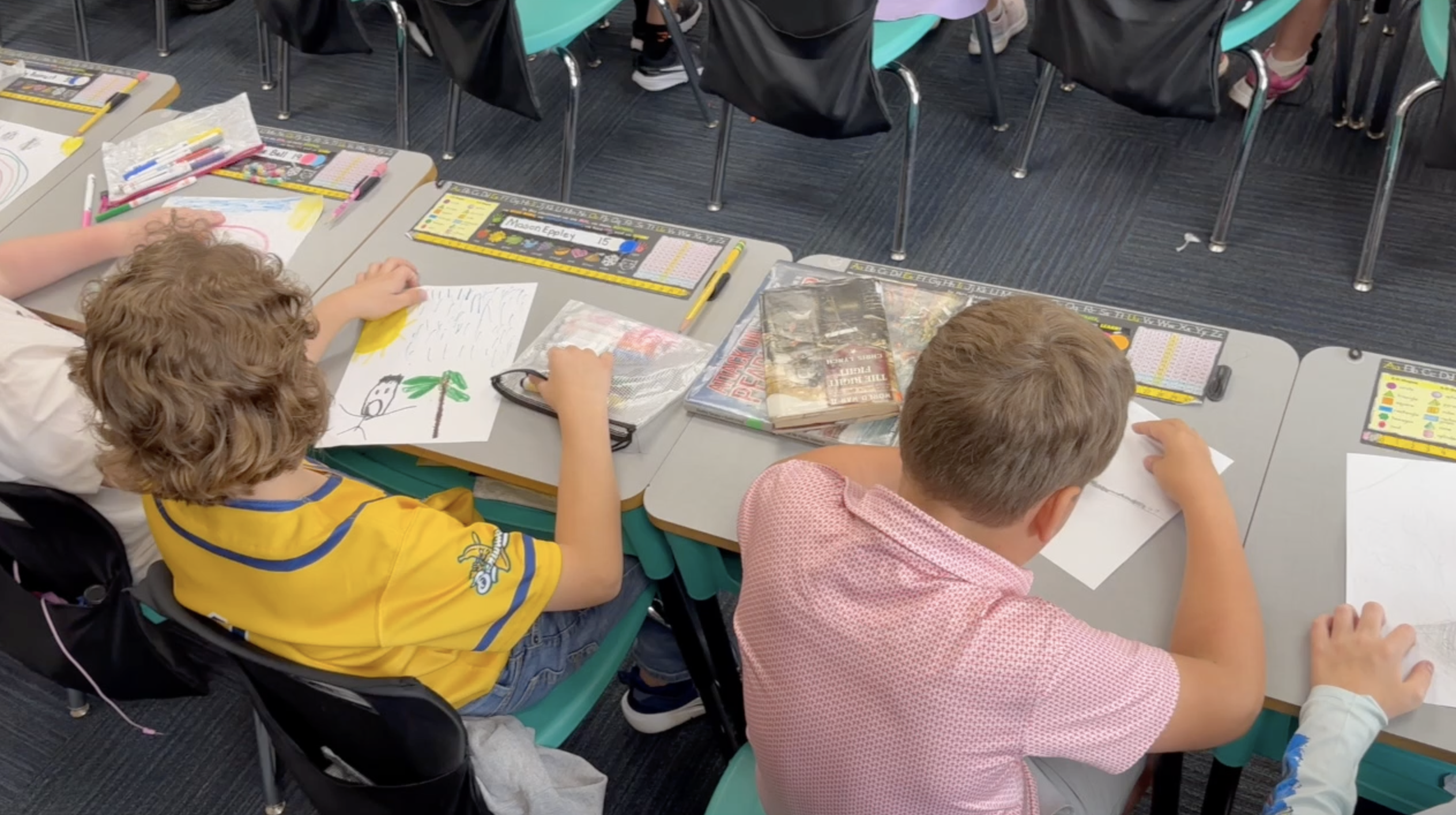 Gilchrist second grade students drawing Spring