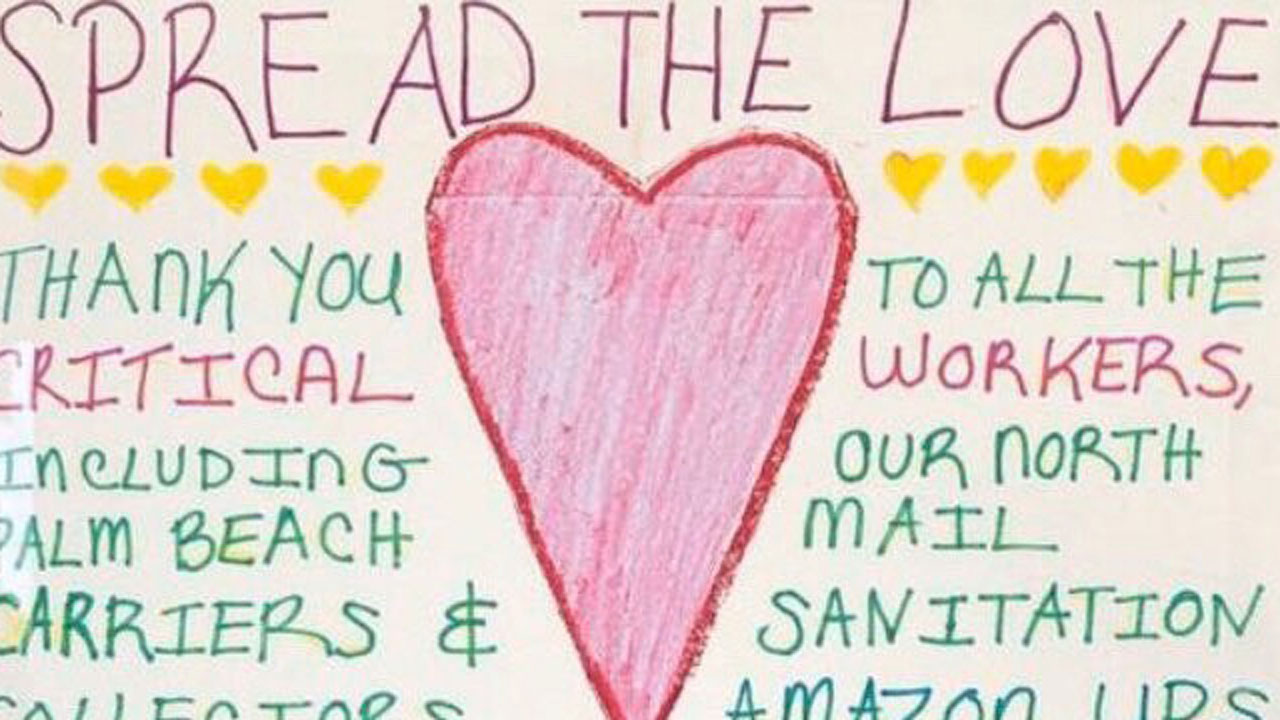 'Spread the Love' poster in North Palm Beach 
