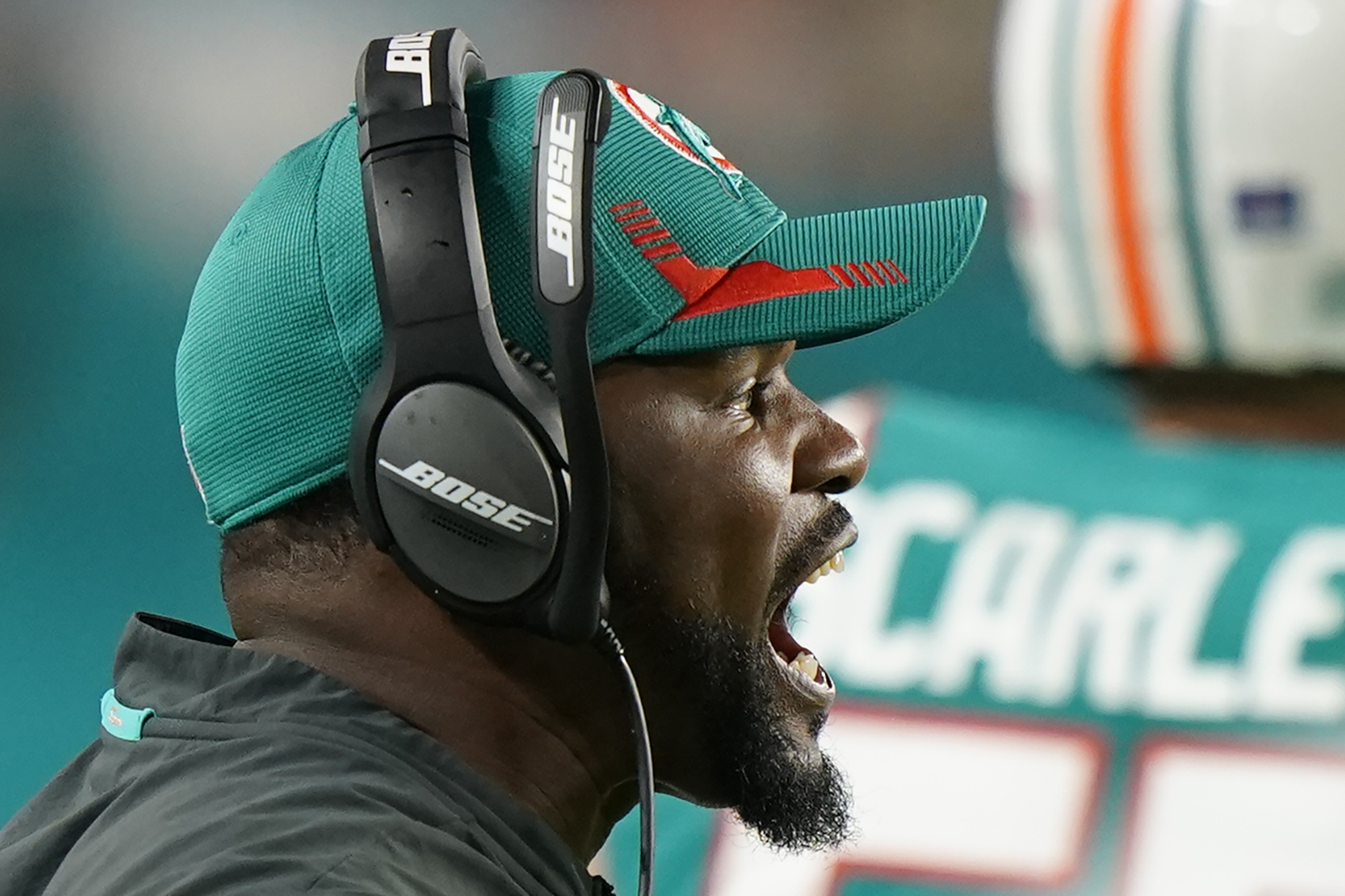 Miami Dolphins head coach Brian Flores yells during game vs. New England Patriots, Jan. 9, 2022