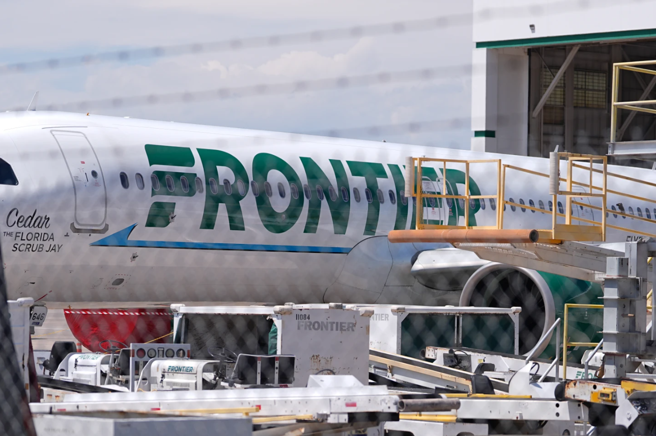 Frontier Airlines jetliner number n646fr sits outside the airlines' technical operations center with other jetliners in for service north of Denver International Airport Saturday, May 9, 2026, in Denver.
