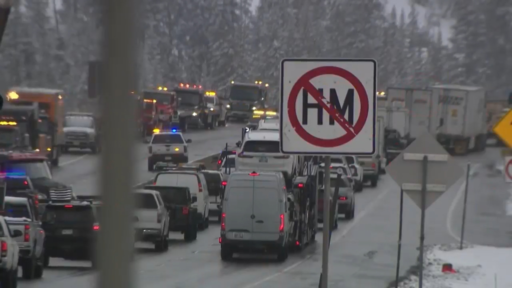 This grab from video shows traffic backed up after a multi-vehicle pile up on a section of a snowy highway in Clear Creek County, Colorado, Tuesday, April 14, 2026. 