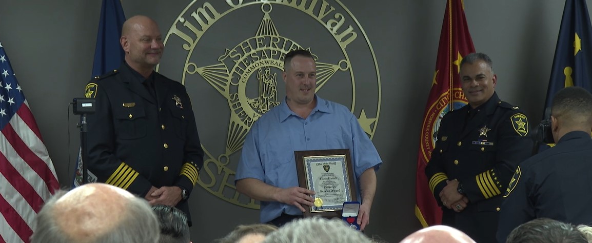 Curtis Harrell with Sheriff Sullivan and Undersheriff Rosado