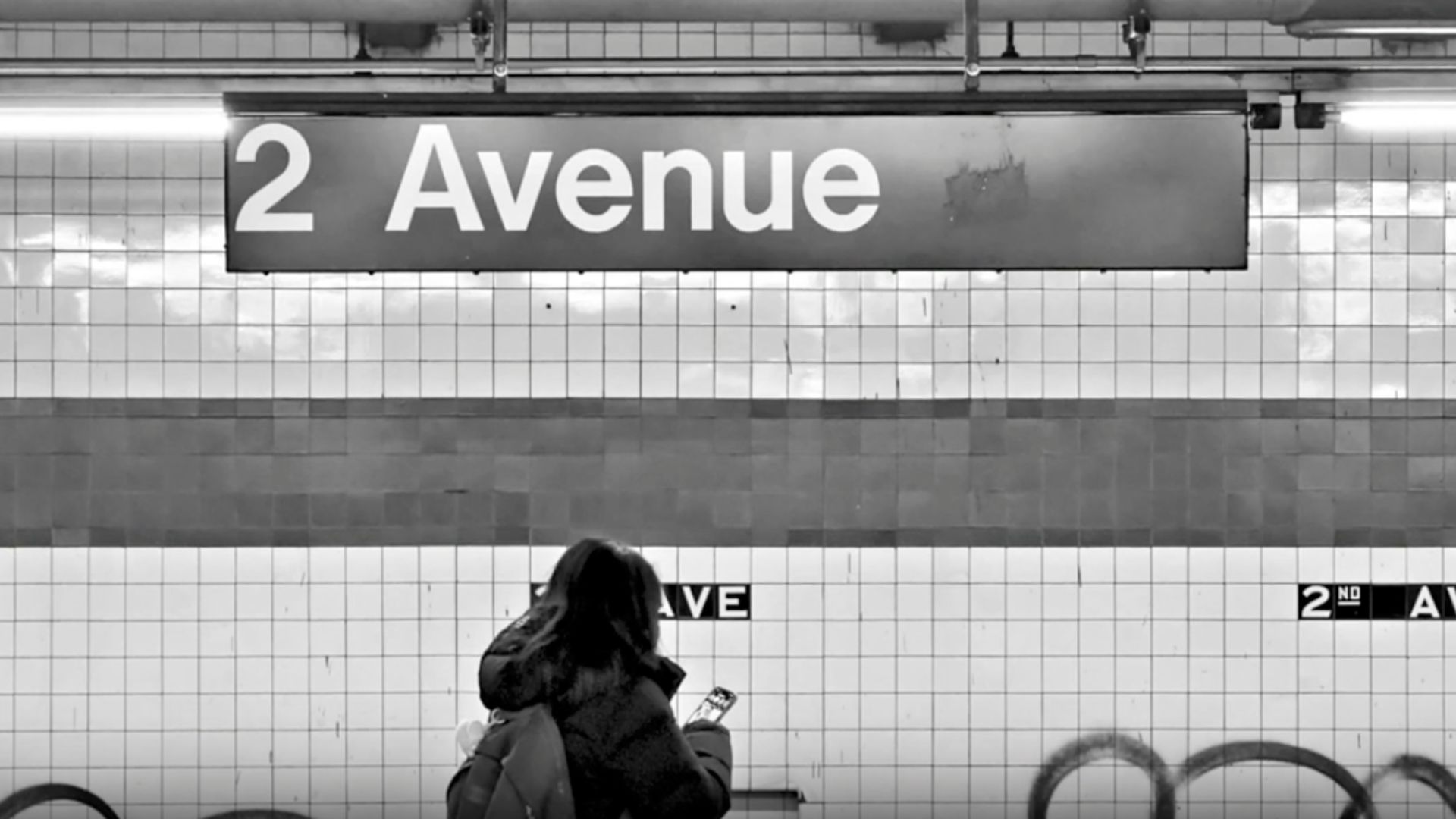 A sign reading "2 Avenue" in New York City's subway system.