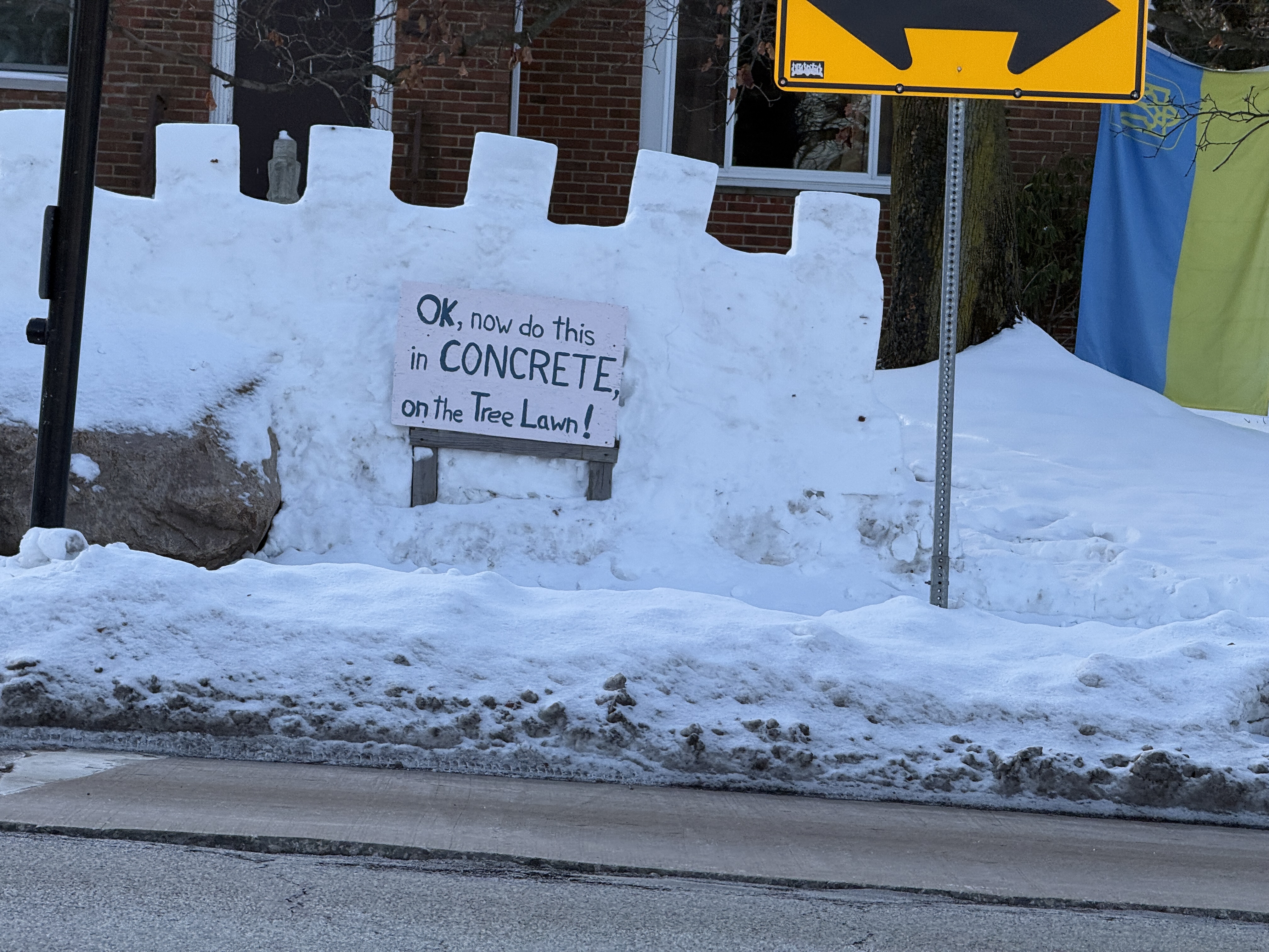 Man builds snow guardrail in front of his Cleveland Heights home