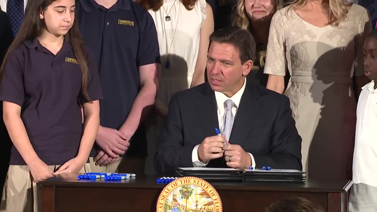 Governor Ron DeSantis signs bills at Cambridge Christian school