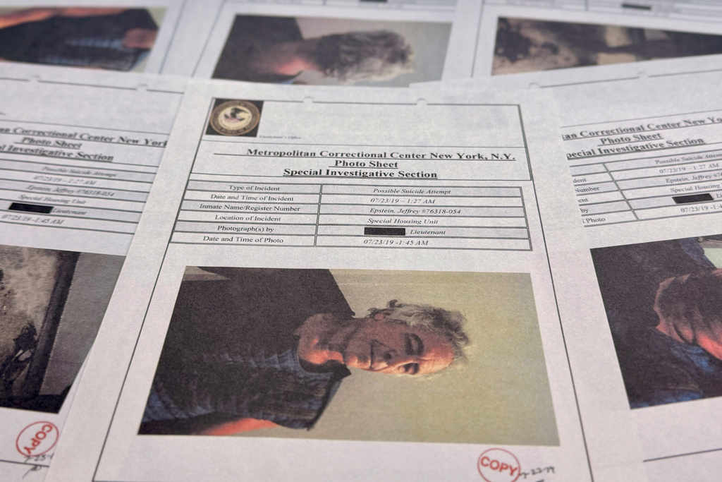 Documents that were included in the U.S. Department of Justice release of the Jeffrey Epstein files are photographed Friday, Jan. 2, 2026. 