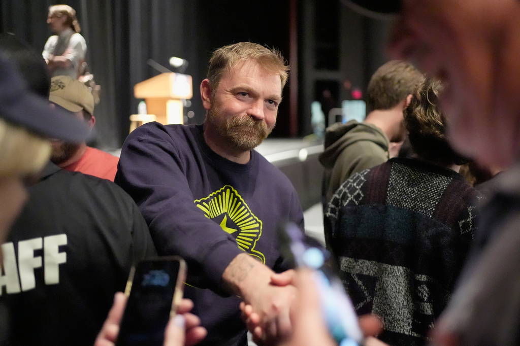 Graham Platner, Democratic candidate for U.S. Senate, greets supporters after speaking at an event hosted by Sen. Bernie Sanders in Orono, Maine, Sunday, May 24, 2026.