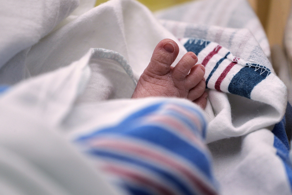 The toes of a baby are seen at a hospital.